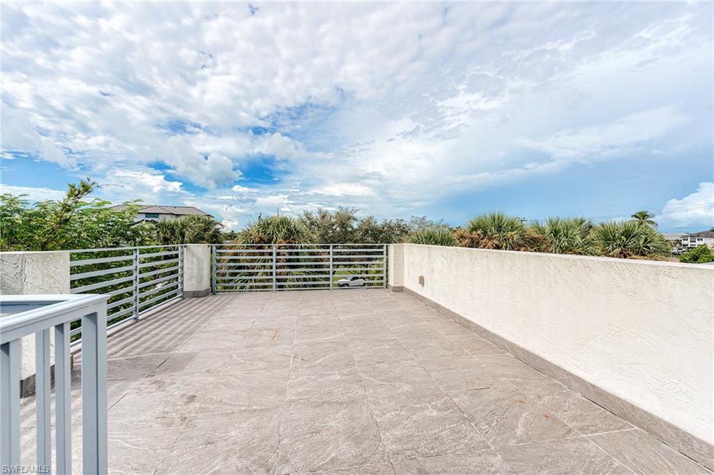 145 Capri Boulevard Naples, FL 34113 - Photo 13 of 33 a view of terrace with city view