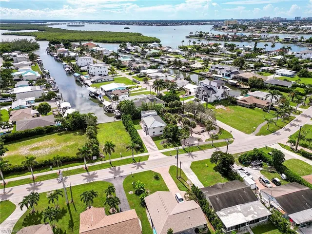 a en suite bathroom with a double vanity sink a mirror and a shower