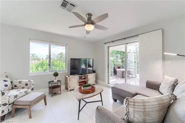 a outdoor living space with furniture and garden view