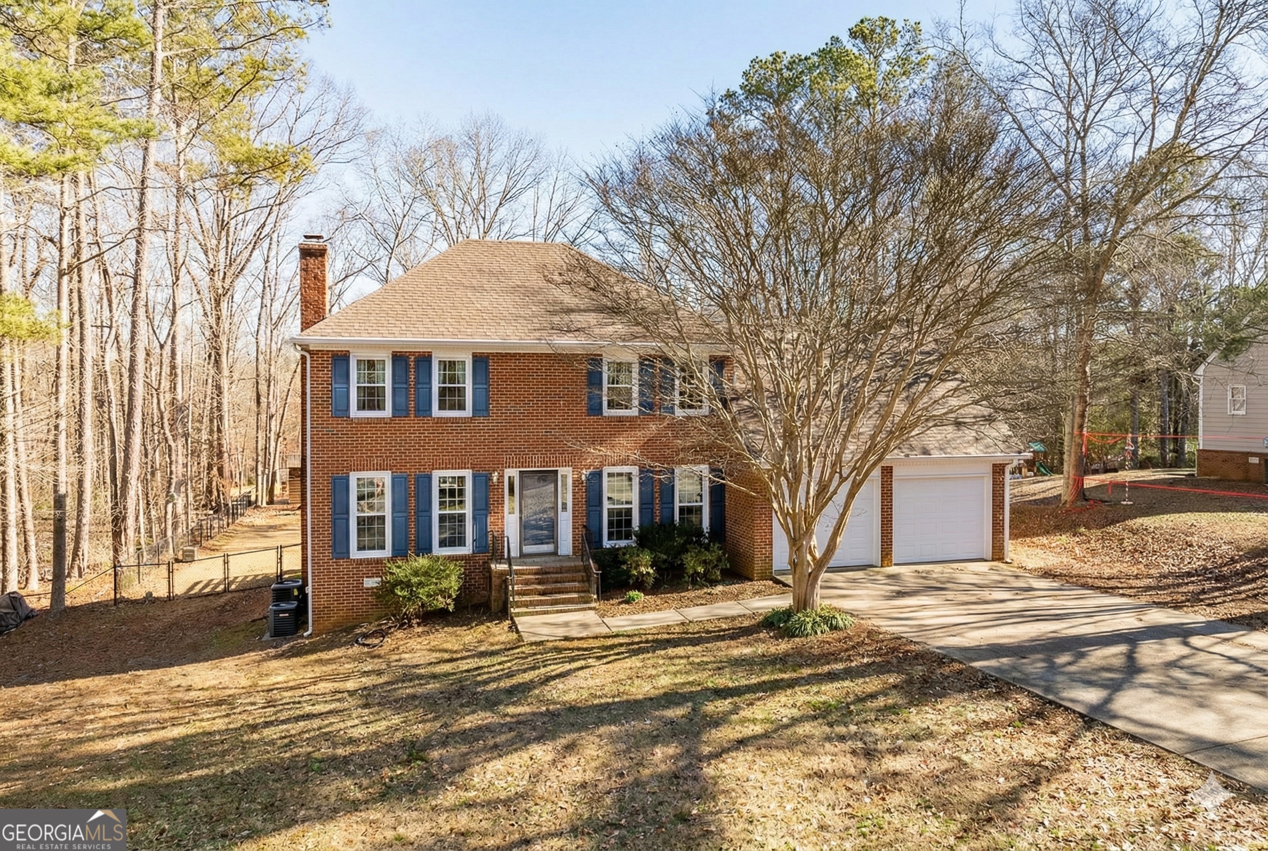 415 Brookstone Drive Athens, GA 30605 - Photo 1 of 55 a view of a house with a snow in front of it