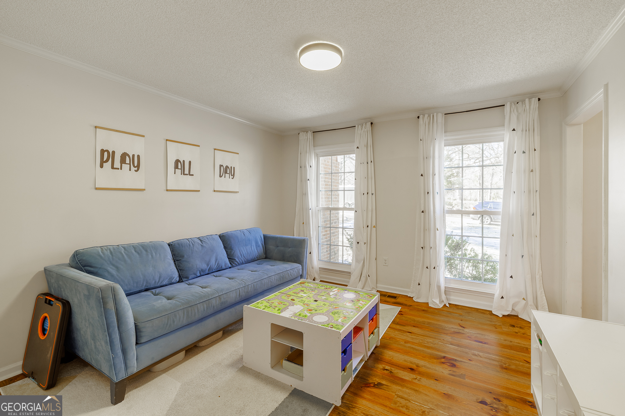 415 Brookstone Drive Athens, GA 30605 - Photo 13 of 55 a living room with furniture and a window