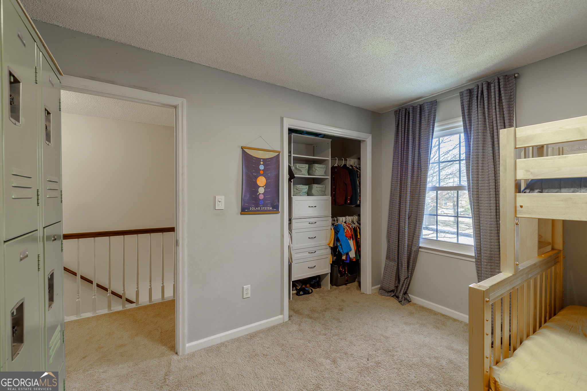 415 Brookstone Drive Athens, GA 30605 - Photo 25 of 55 a view of an empty room with window and stairs