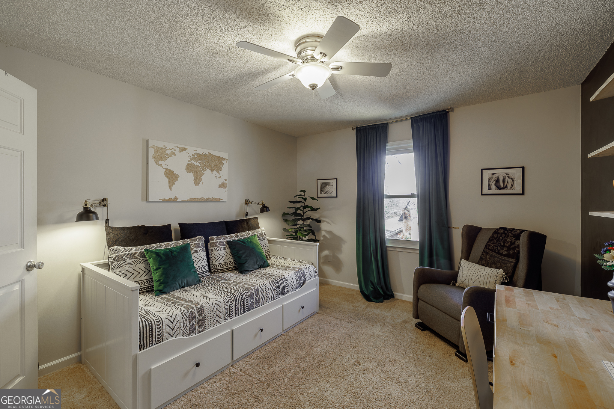 415 Brookstone Drive Athens, GA 30605 - Photo 26 of 55 a living room with furniture and a lamp