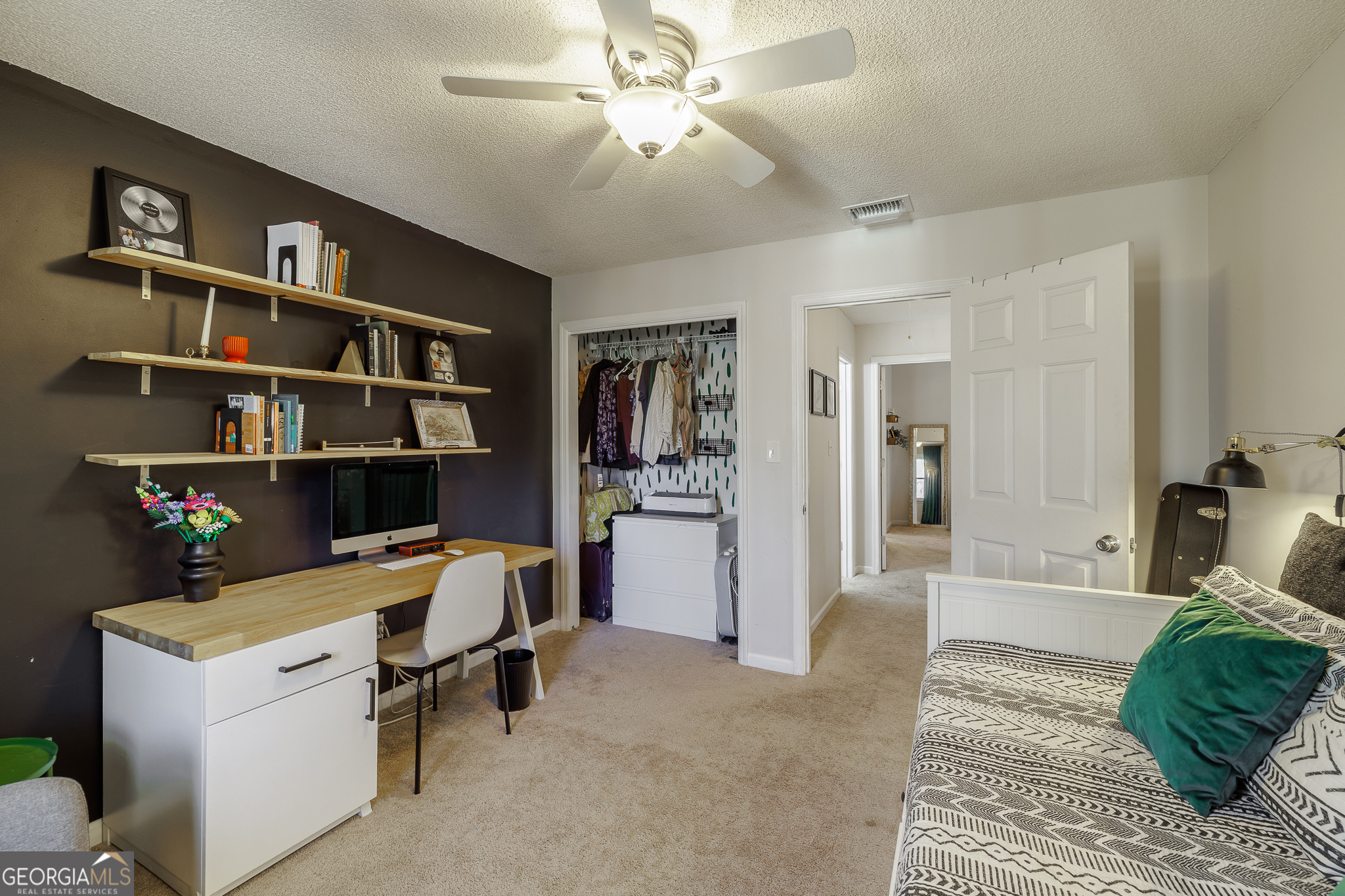 415 Brookstone Drive Athens, GA 30605 - Photo 27 of 55 a view of a livingroom with workspace and a window