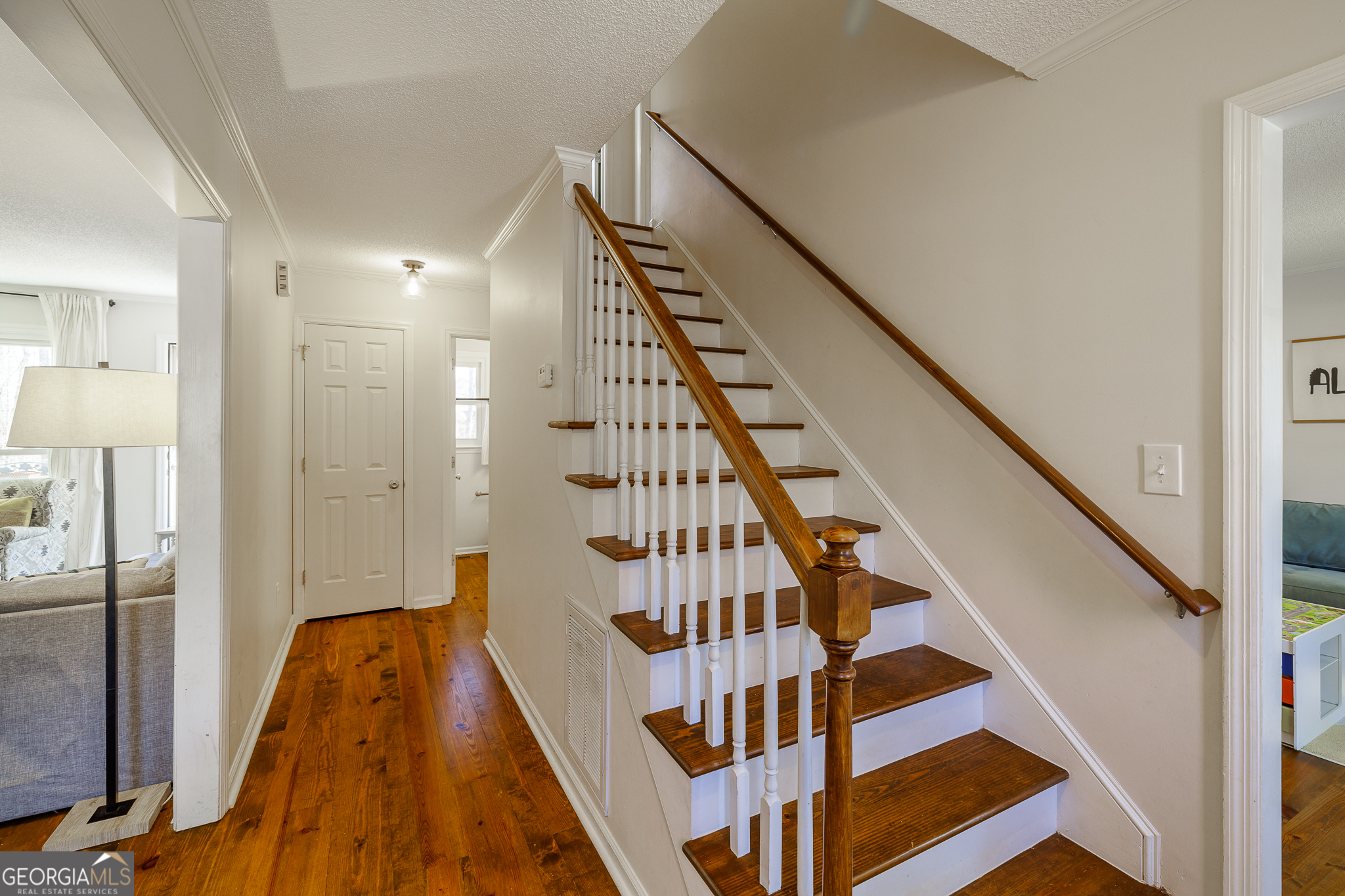 415 Brookstone Drive Athens, GA 30605 - Photo 5 of 55 a view of entryway with wooden floor