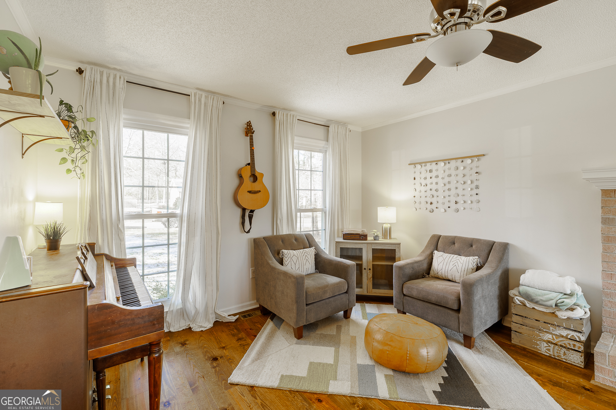 415 Brookstone Drive Athens, GA 30605 - Photo 10 of 55 a living room with furniture and a large window