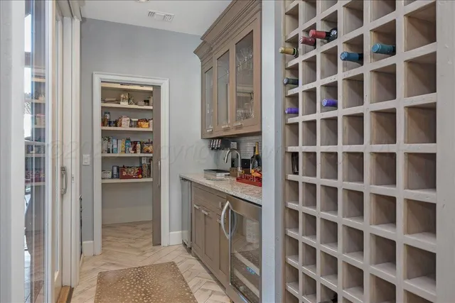a kitchen with a cabinets and a stove