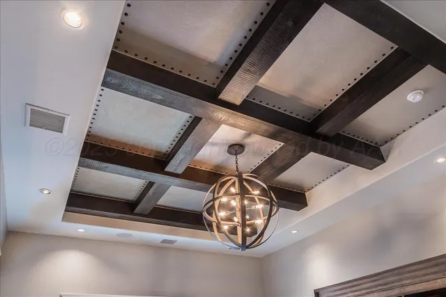 an empty room with wooden floor