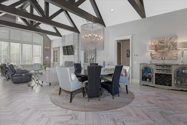 a view of a livingroom with furniture and a fireplace