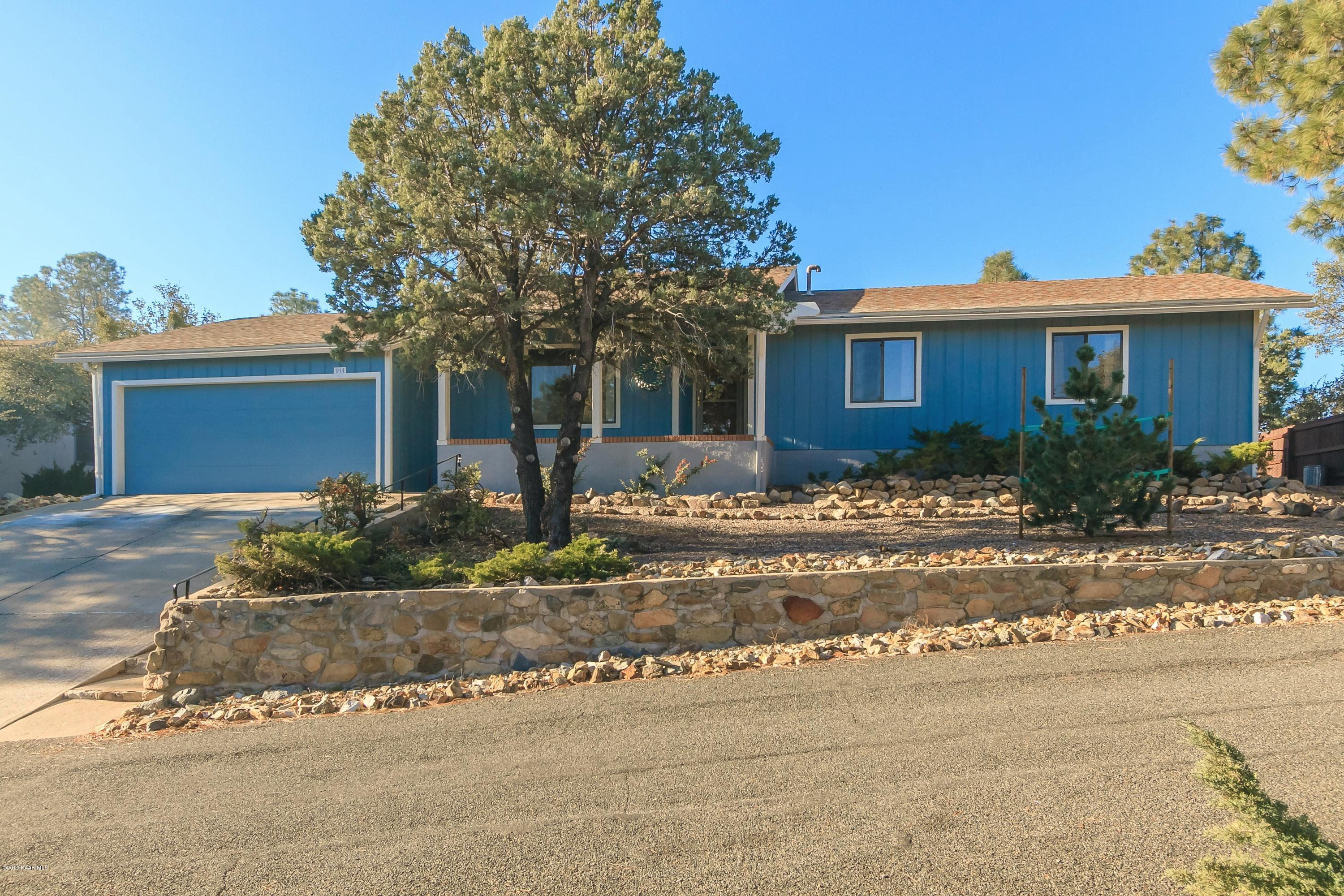 914 Forest Hylands Road Prescott, AZ 86303 - Photo 1 of 22 a front view of a house with a yard