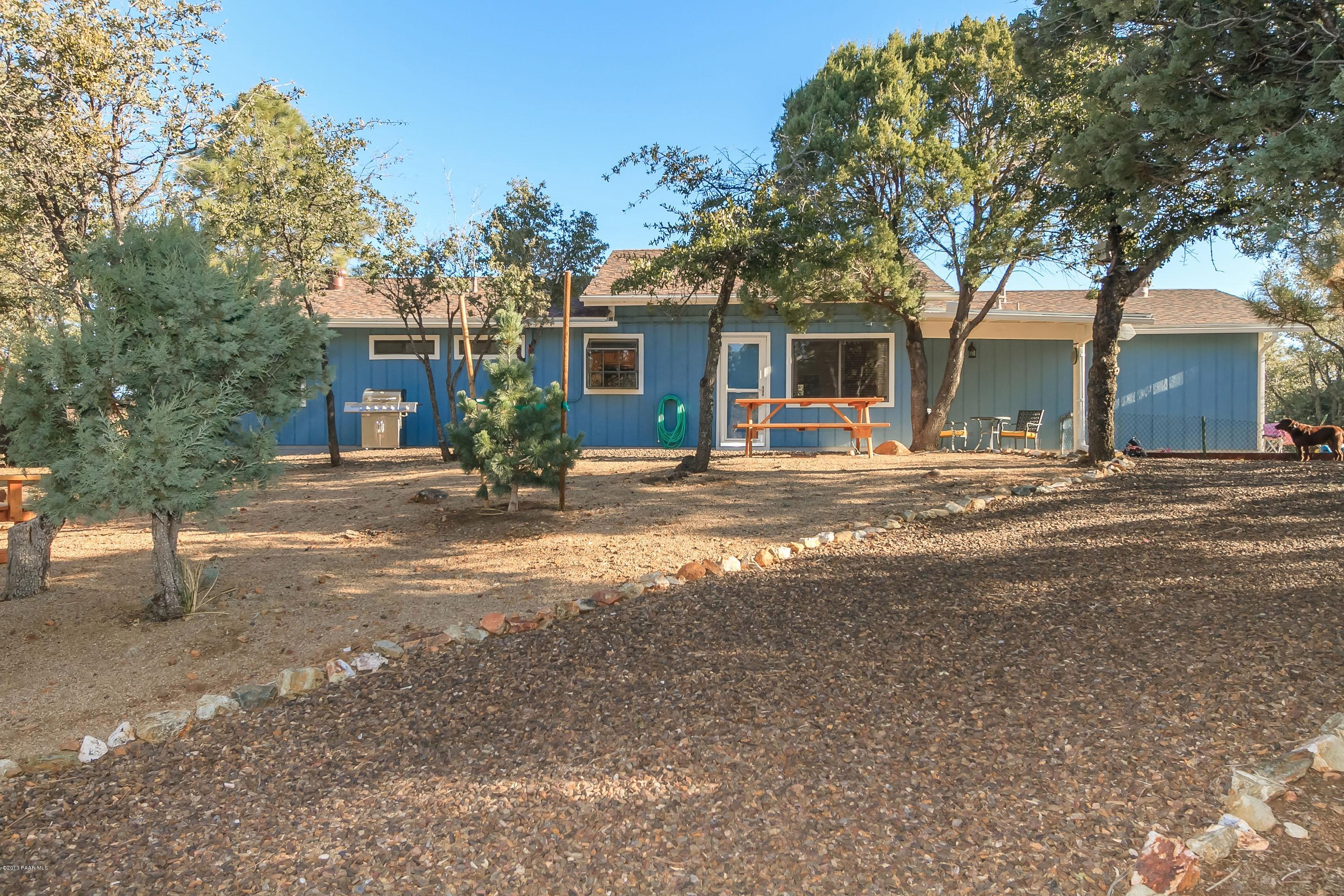 914 Forest Hylands Road Prescott, AZ 86303 - Photo 20 of 22 a view of a house with a tree in front of it