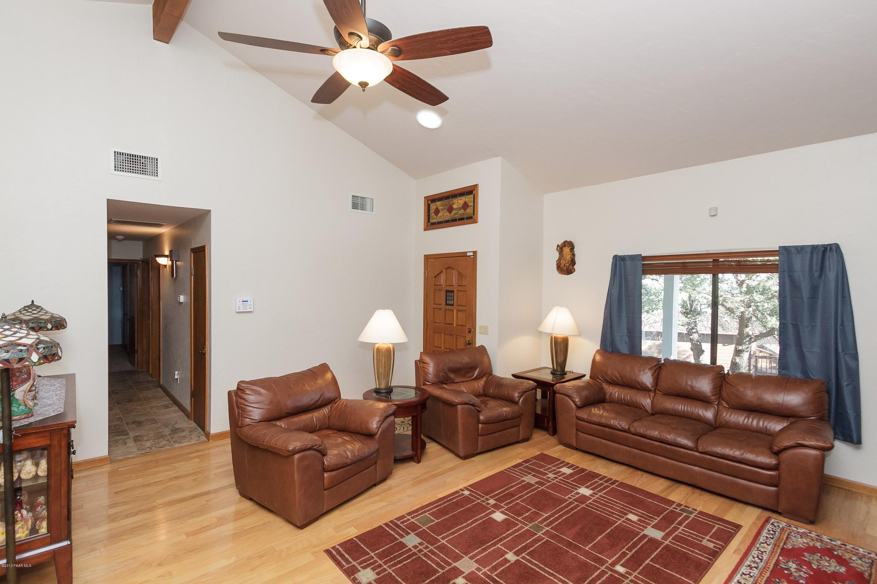 914 Forest Hylands Road Prescott, AZ 86303 - Photo 3 of 22 a living room with furniture and a window