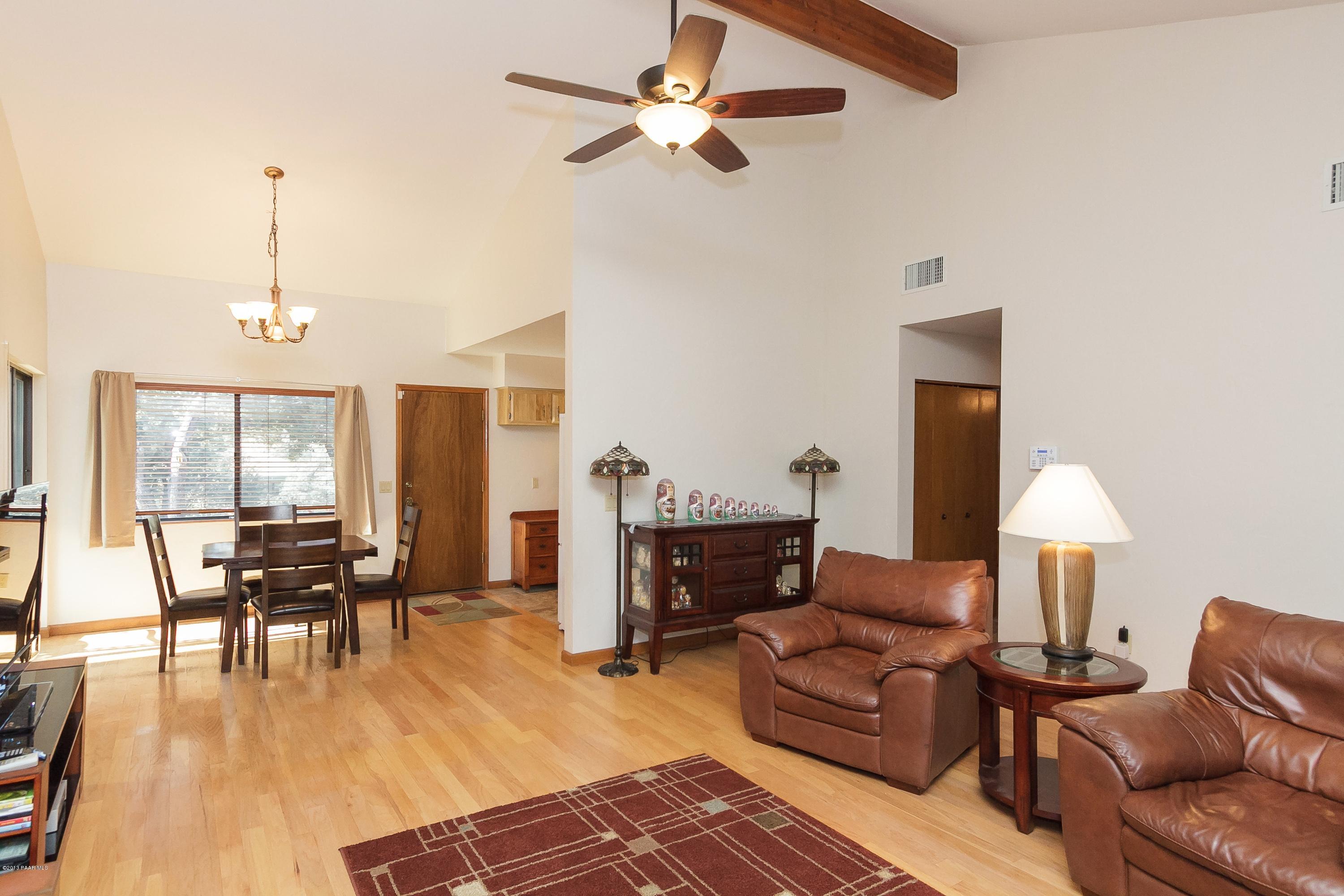 914 Forest Hylands Road Prescott, AZ 86303 - Photo 4 of 22 a living room with furniture and wooden floor