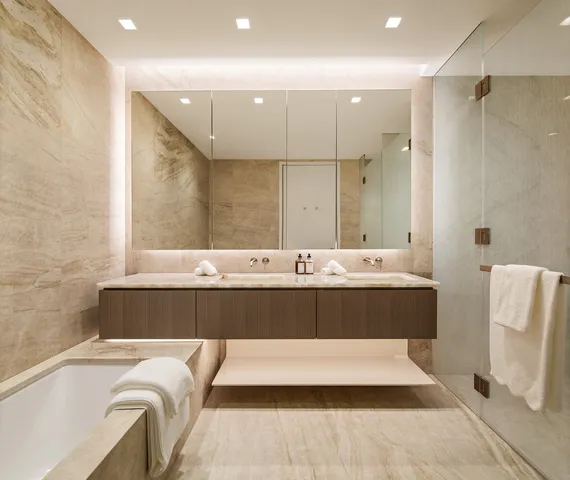 a room with a bed and a desk