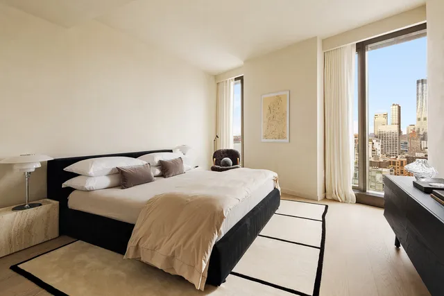 a bathroom with a bathtub and a sink