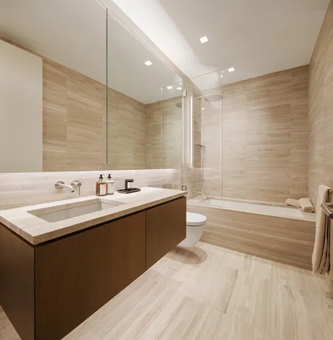 a bedroom with bed and balcony