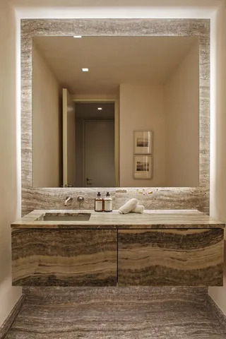 a bathroom with a bathtub and sink
