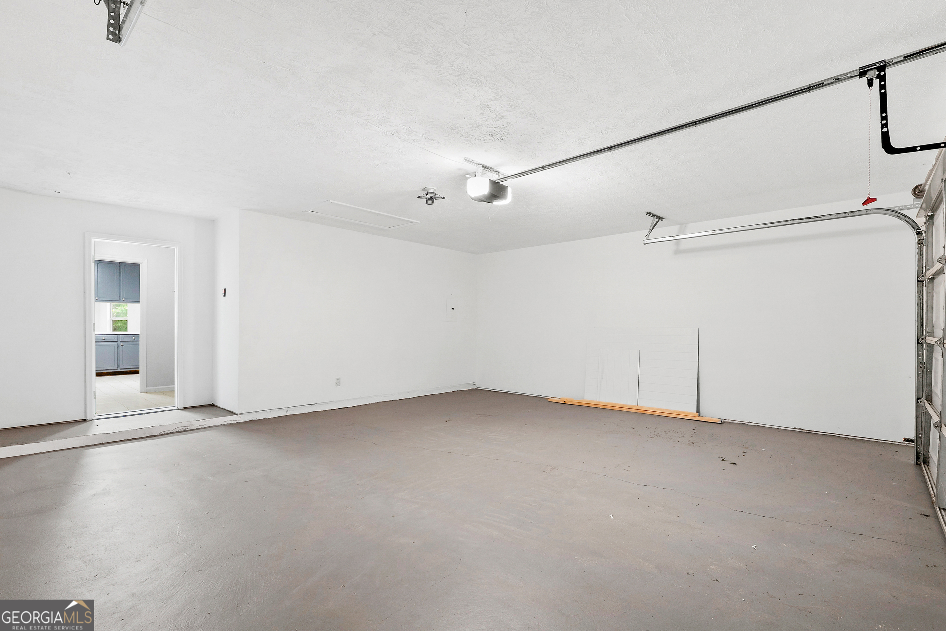 1328 Foxvale Drive Hampton, GA 30228 - Photo 25 of 27 an empty room with a ceiling fan and window