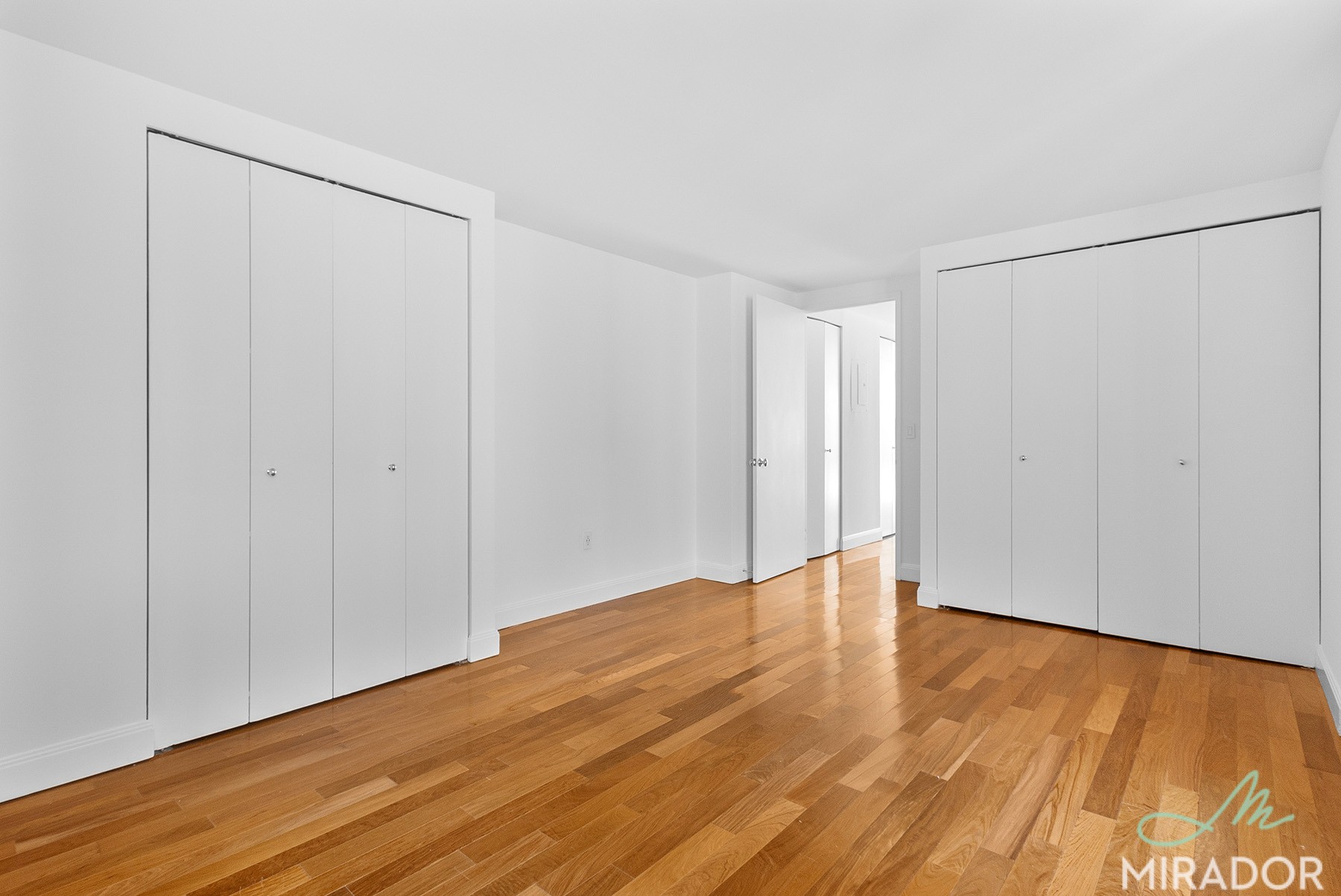 290 3rd Avenue, Unit 4C Manhattan, NY 10010 - Photo 14 of 27 a view of an empty room with wooden floor