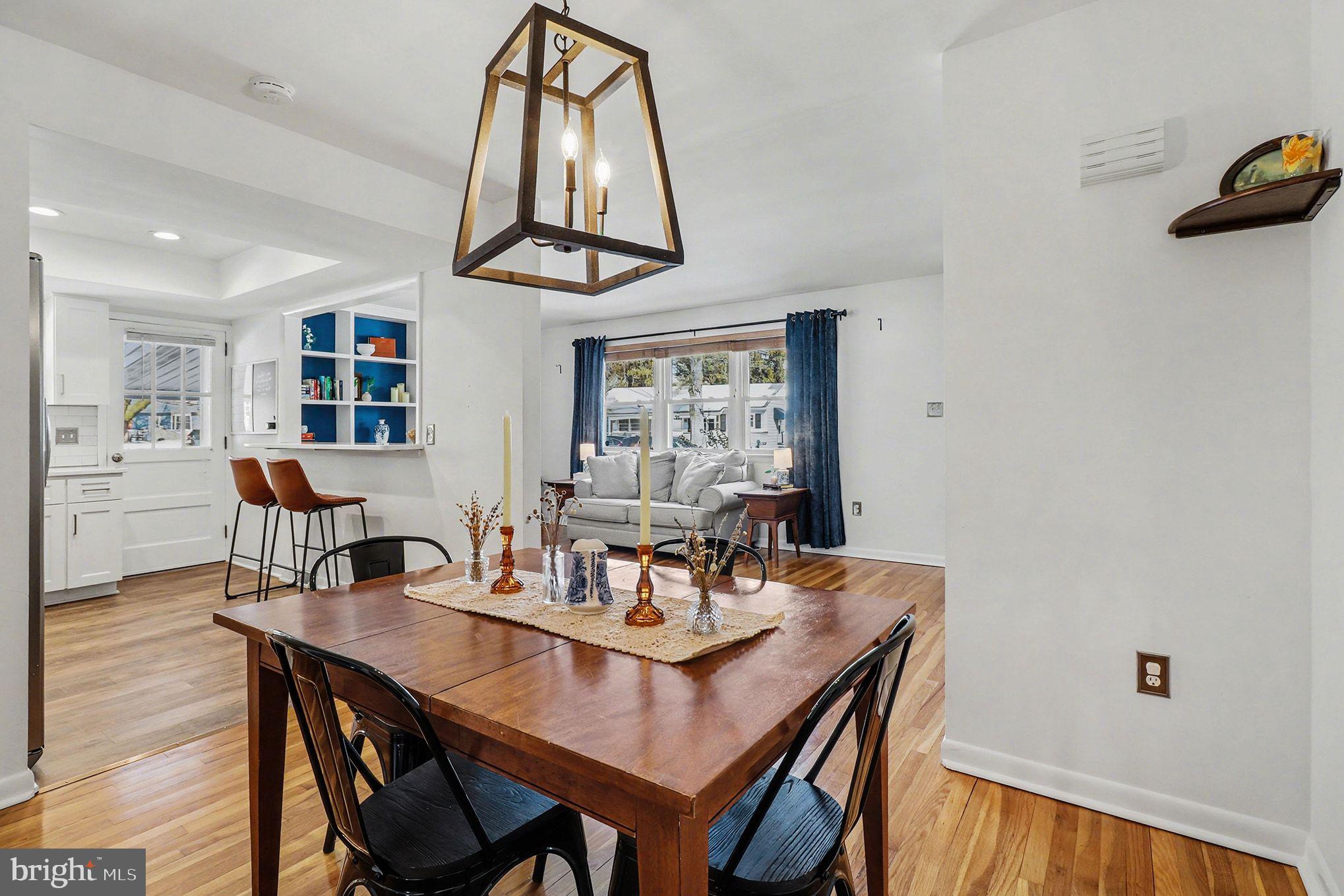 504 Hensley Street Lititz, PA 17543 - Photo 12 of 34 a view of a dining room with furniture and wooden floor