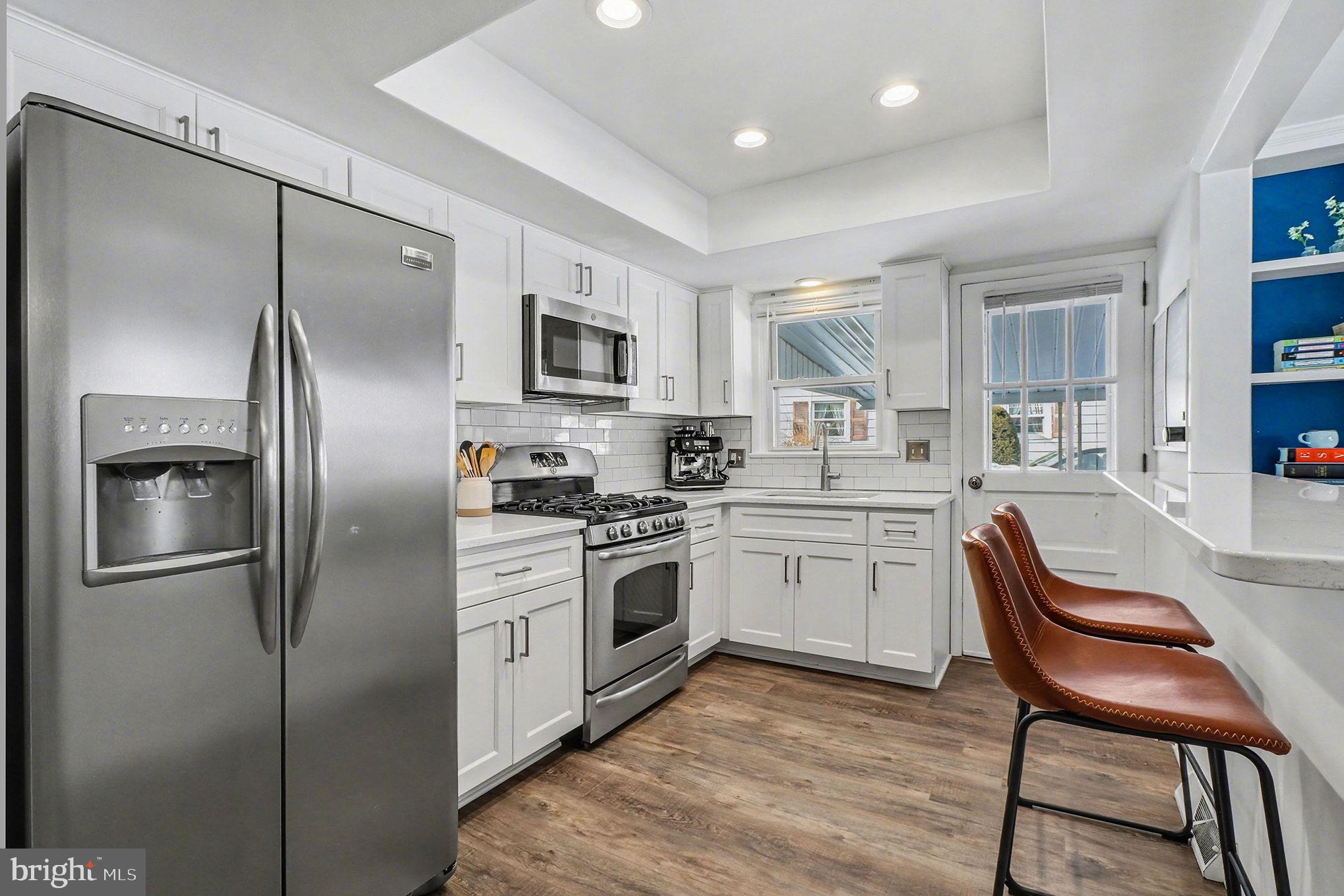 504 Hensley Street Lititz, PA 17543 - Photo 13 of 34 a kitchen with a refrigerator stove and sink