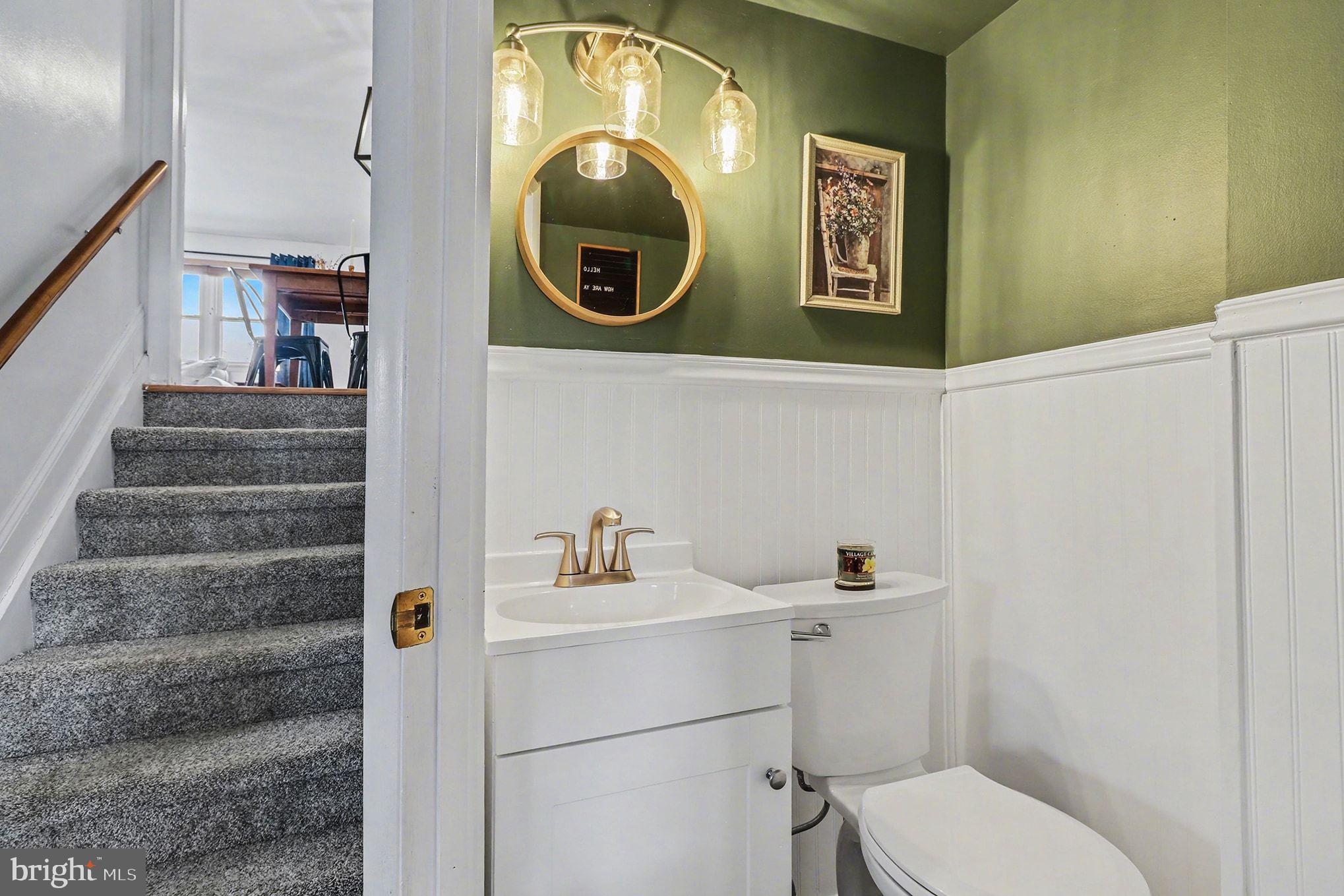 504 Hensley Street Lititz, PA 17543 - Photo 15 of 34 a bathroom with a toilet and a sink