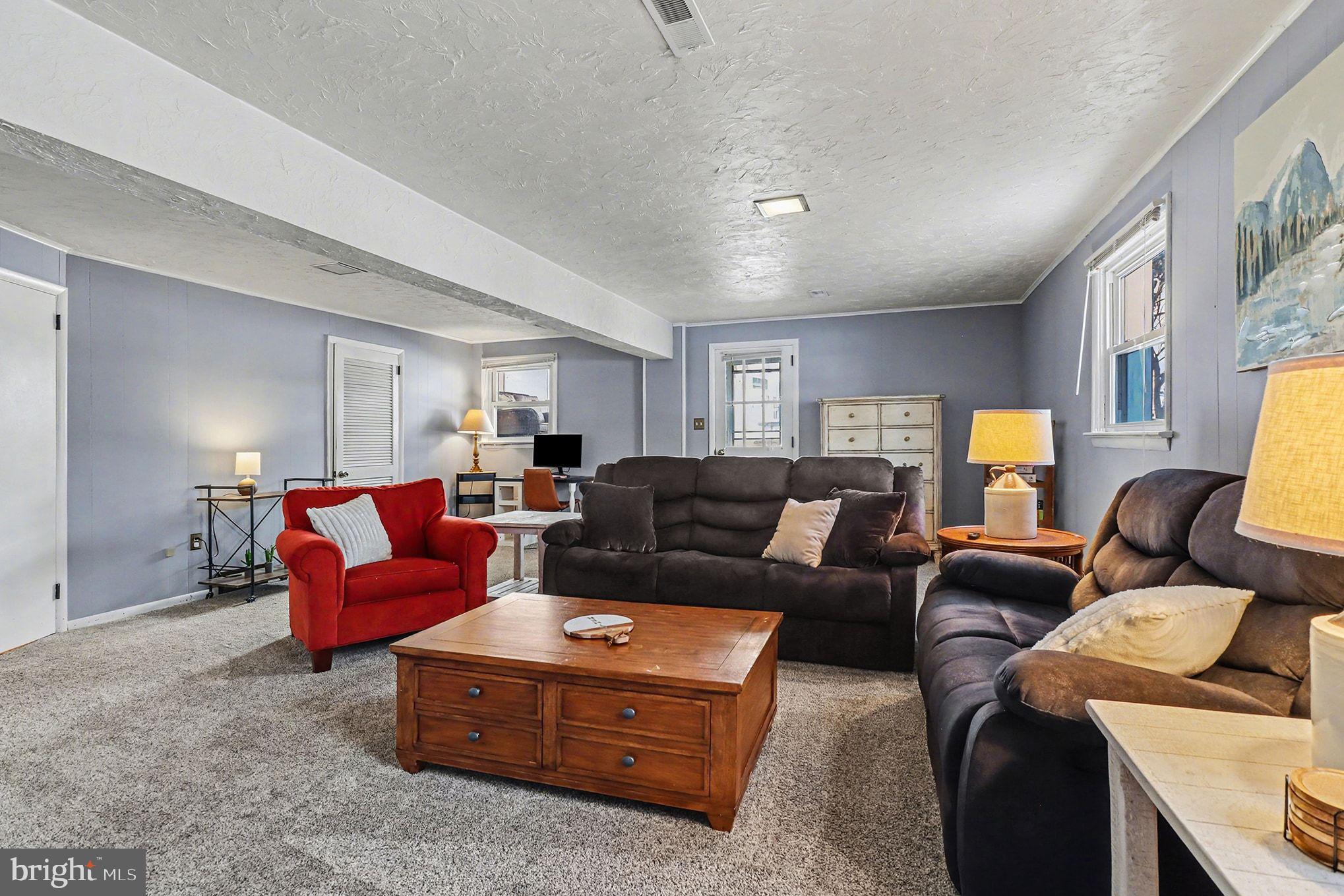 504 Hensley Street Lititz, PA 17543 - Photo 17 of 34 a living room with furniture and a window