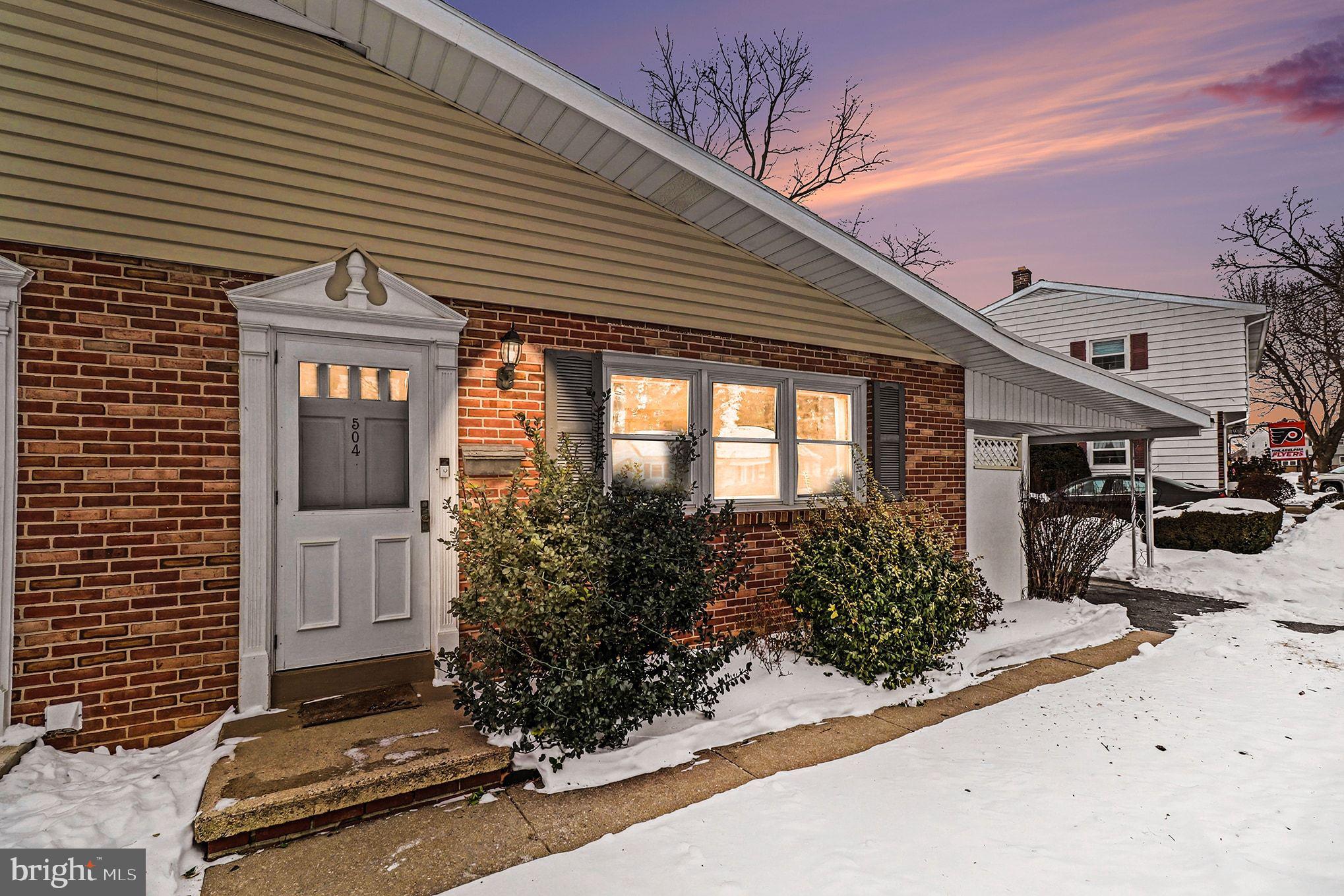 504 Hensley Street Lititz, PA 17543 - Photo 2 of 34 a front view of a house with garden