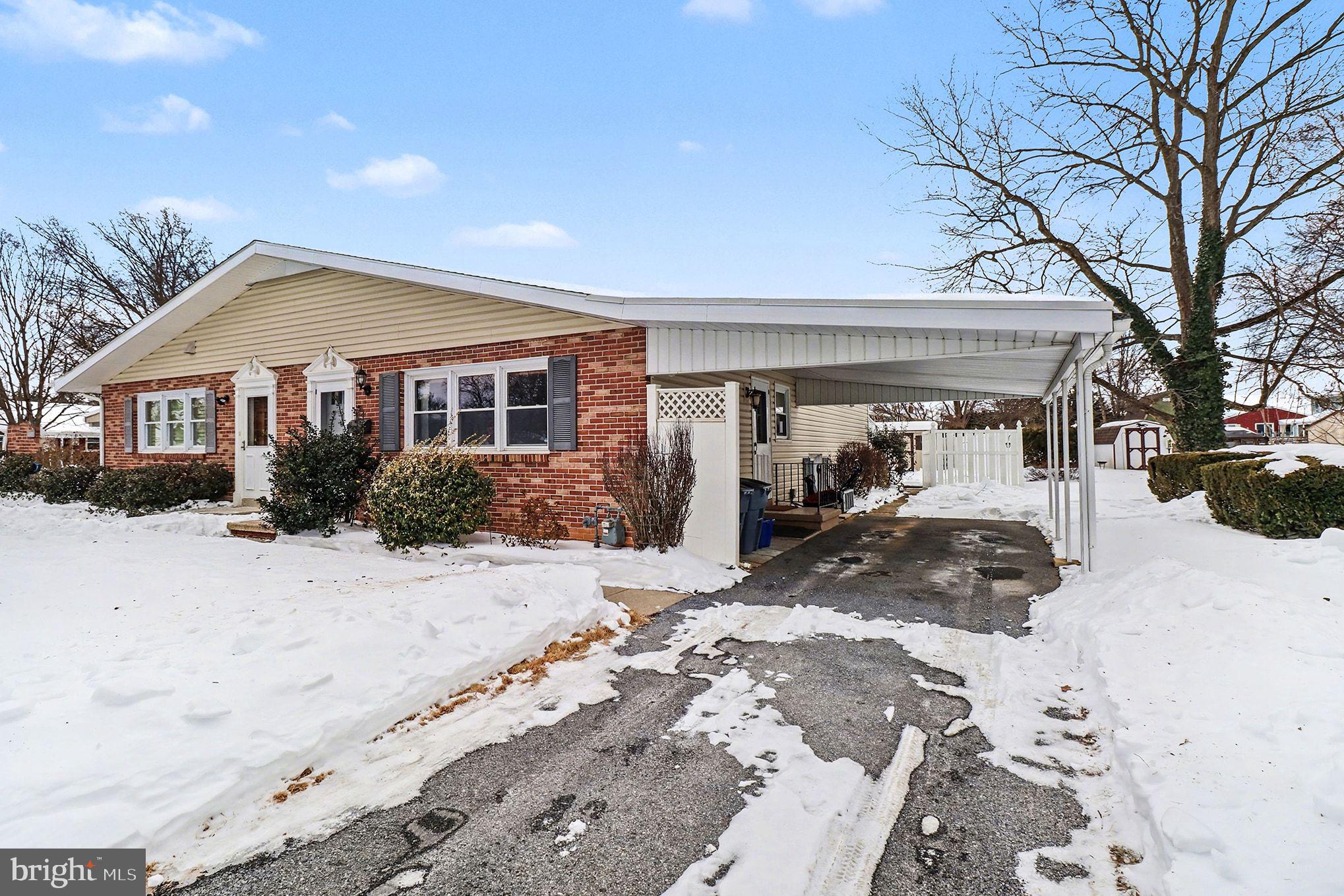 504 Hensley Street Lititz, PA 17543 - Photo 4 of 34 a view of a house with snow on the road