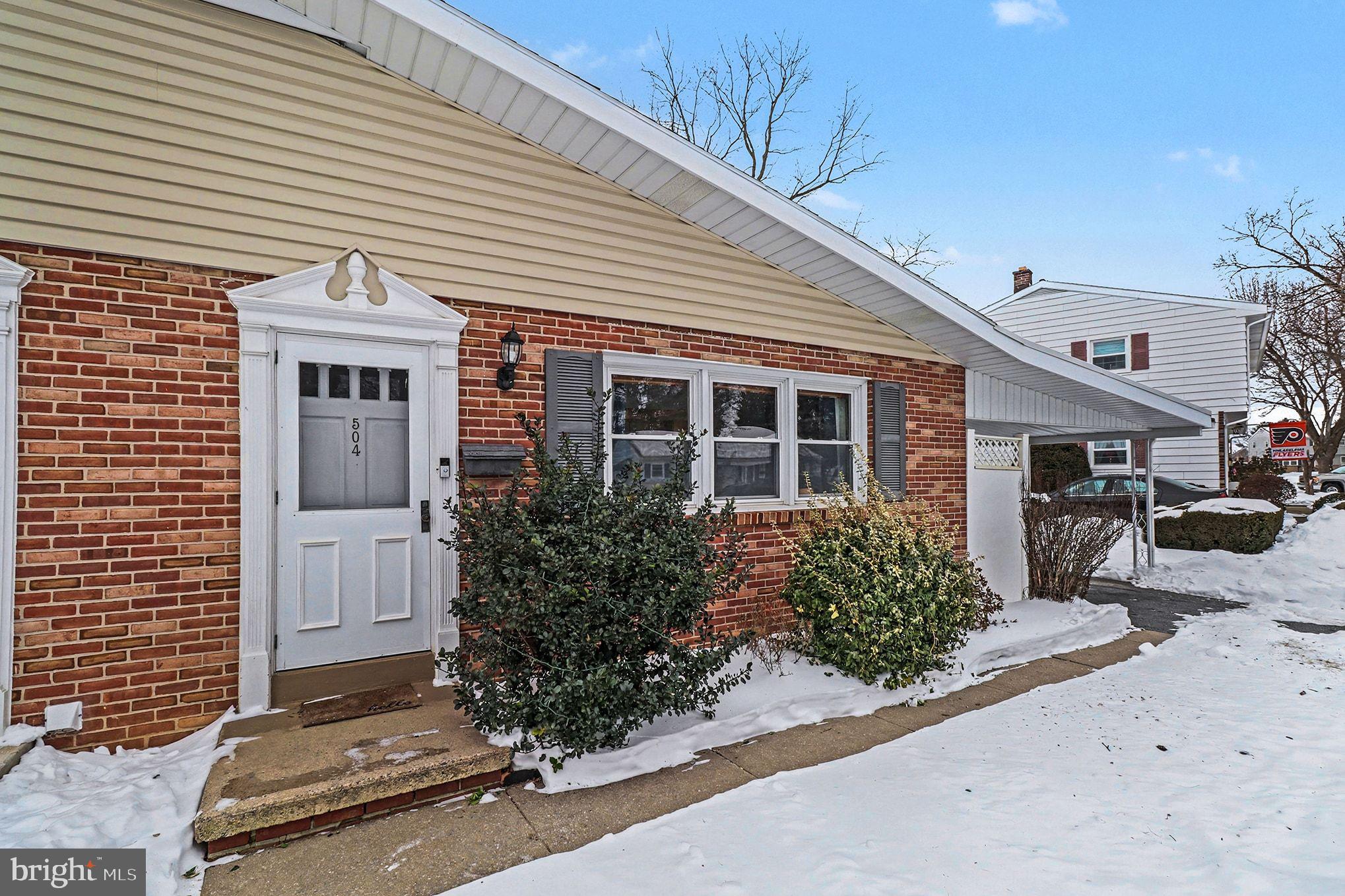 504 Hensley Street Lititz, PA 17543 - Photo 7 of 34 a front view of a house with garden