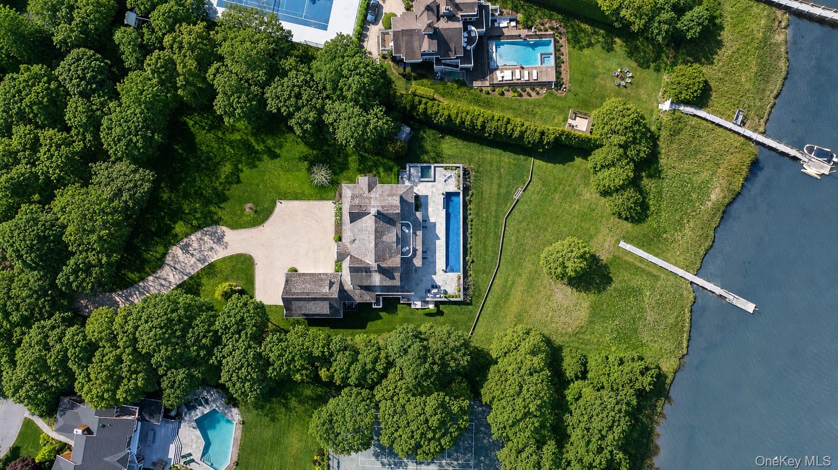 43 Old Main Road Quogue, NY 11959 - Photo 4 of 28 an aerial view of a house with outdoor space sitting space and trees
