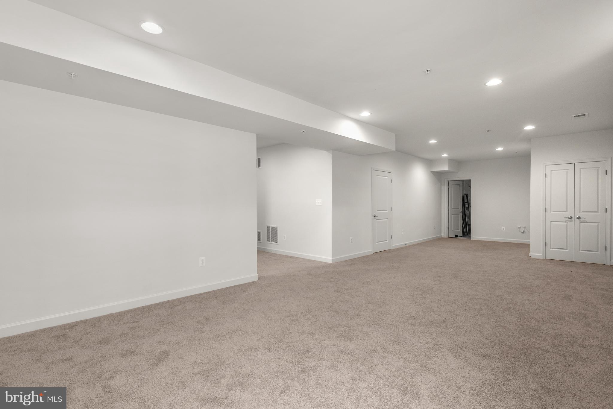 11012 North Riding Road Upper Marlboro, MD 20772 - Photo 41 of 54 Basement Rec Room (with wet bar rough in)
