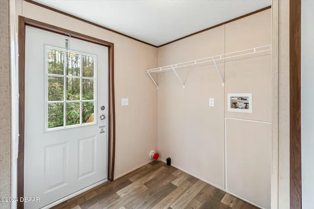 a bathroom with a granite countertop sink toilet a mirror and shower