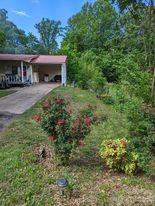 180 Sunset Drive Rutherfordton, NC 28139 - Photo 43 of 44 a view of a house with a yard