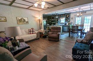 180 Sunset Drive Rutherfordton, NC 28139 - Photo 5 of 44 a living room with furniture and a large window