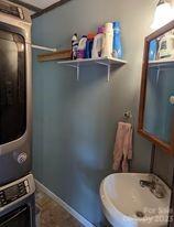 180 Sunset Drive Rutherfordton, NC 28139 - Photo 10 of 44 a bathroom with a sink and a mirror