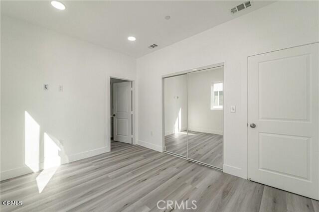 6375 Converse Avenue, Unit A Los Angeles, CA 90001 - Photo 7 of 14 a view of hallway with wooden floor