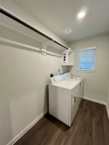 a utility room with washer and dryer