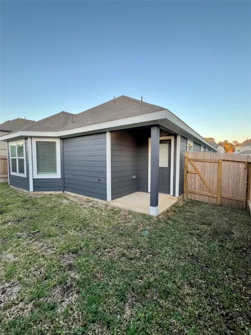 a house view with a garden space