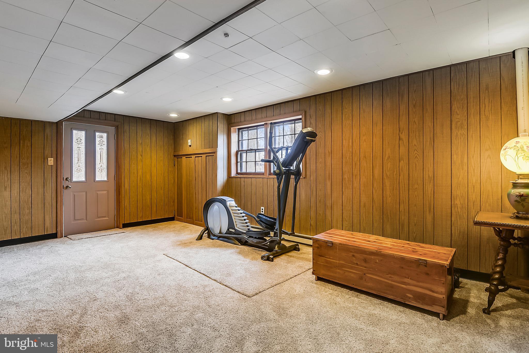 17717 Pond Road Ashton, MD 20861 - Photo 34 of 51 Walk out basement rec room