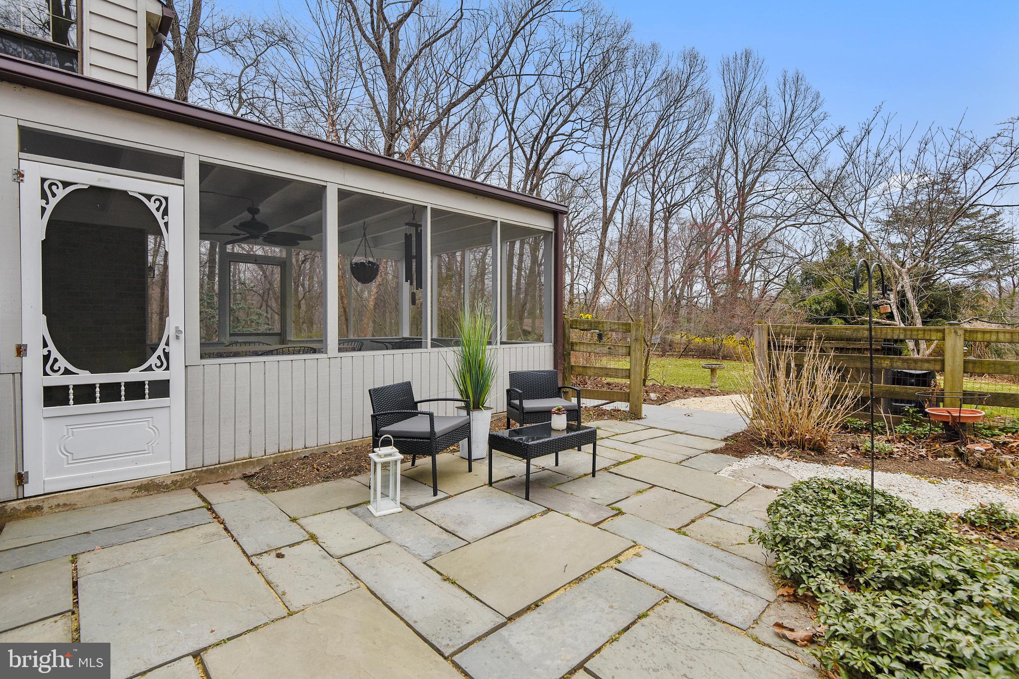 17717 Pond Road Ashton, MD 20861 - Photo 45 of 51 Screen porch overlooking back yard