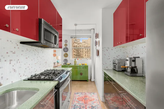 a kitchen with a stove and a sink