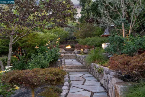 a view of a backyard of a house