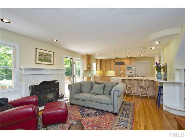 2700 Old Sugar Road Durham, NC 27707 - Photo 5 of 25 Family Room has fireplace w/insert and open to the kitchen. Den/Family/Great Room