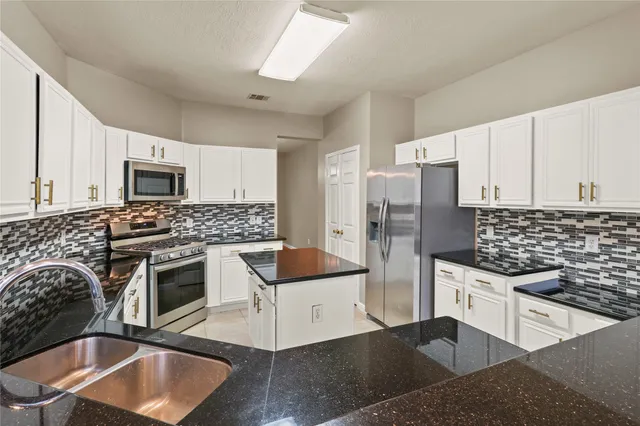 $450,000 | 10807 Oak Bayou Lane, Houston, TX 77064