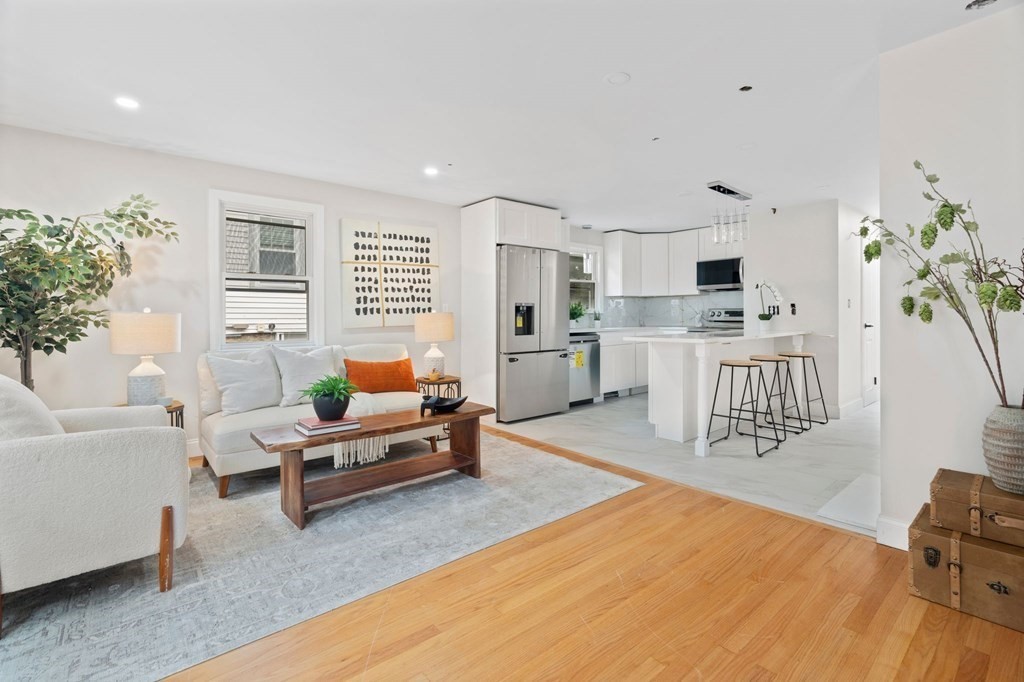 a living room with furniture and a table