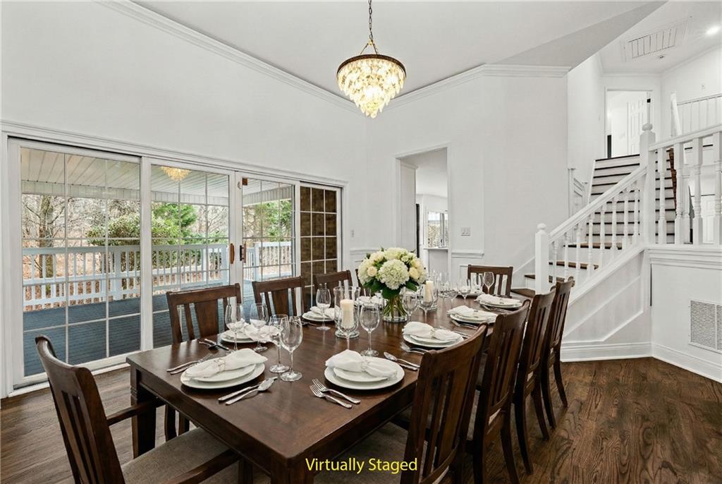 5302 Greenway Drive Villa Rica, GA 30180 - Photo 11 of 81 a view of a dining room with furniture window and wooden floor
