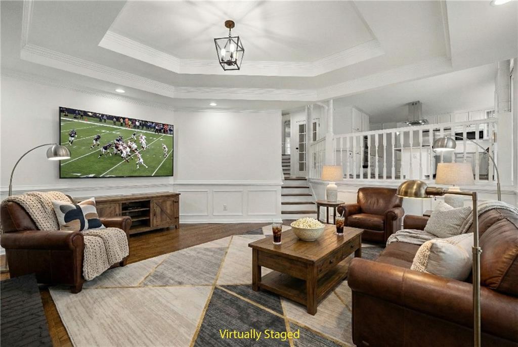 5302 Greenway Drive Villa Rica, GA 30180 - Photo 16 of 79 a living room with furniture and a flat screen tv