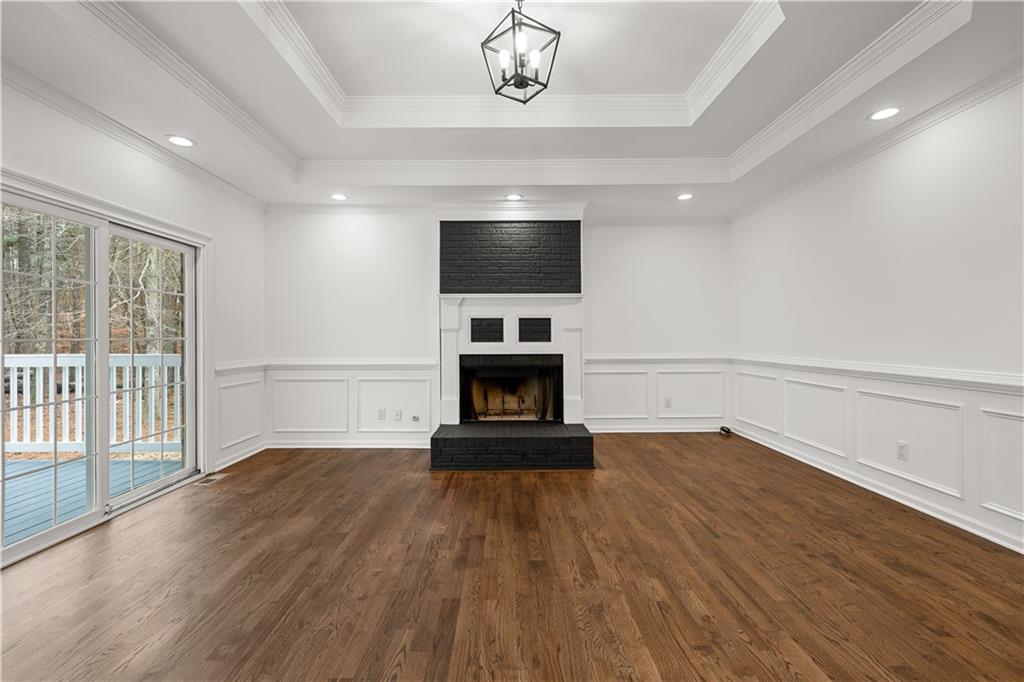 5302 Greenway Drive Villa Rica, GA 30180 - Photo 20 of 81 a living room with a flat screen tv and a fireplace