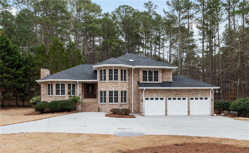5302 Greenway Drive Villa Rica, GA 30180 - Photo 2 of 81 front view of a house with a yard